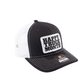 Black and white trucker hat with Happy Truck Month patch on a white background