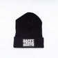 Black knit beanie with a folded brim and a front Happy Truck Month patch on a white background